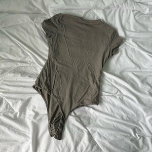 Pumiey gray bodysuit top smooth medium (deodorant marks come out)